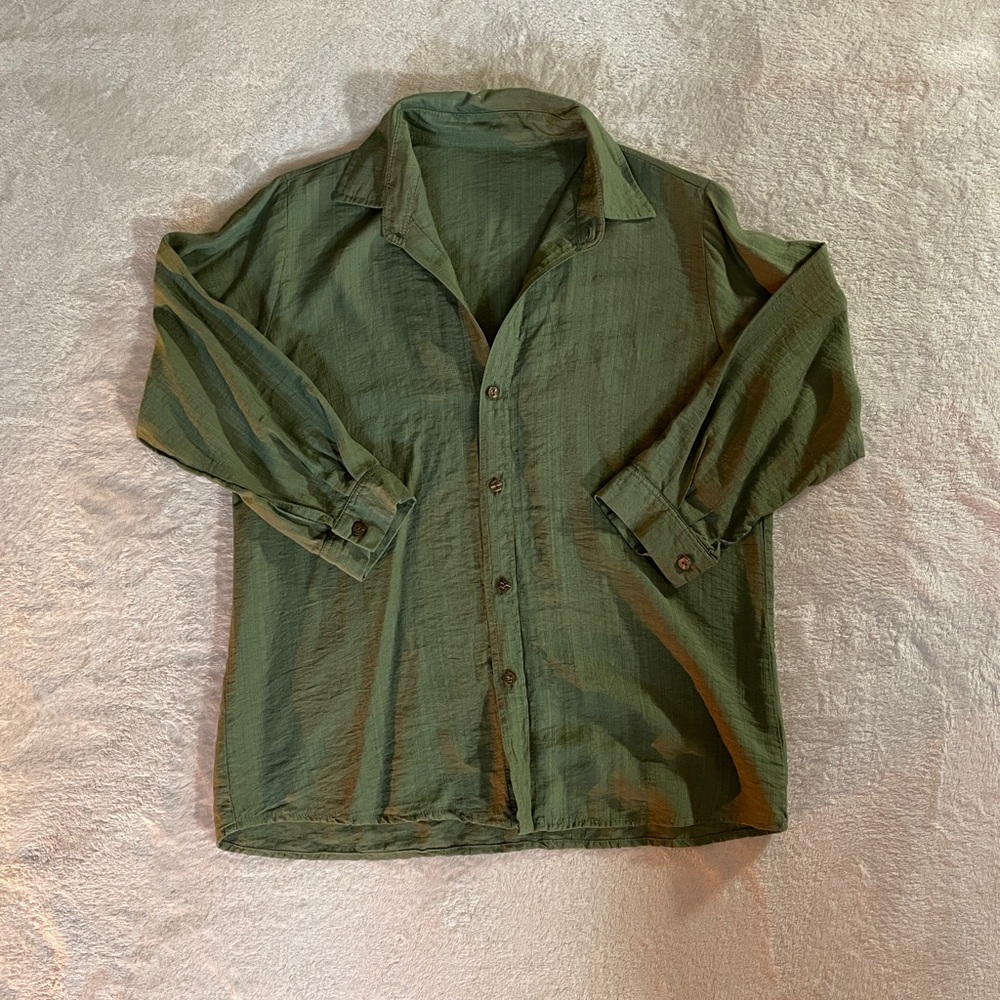 Green button down shirt